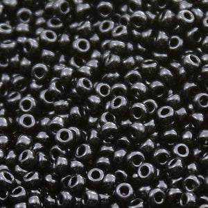 Size 12/0 glass seed beads, opaque black.