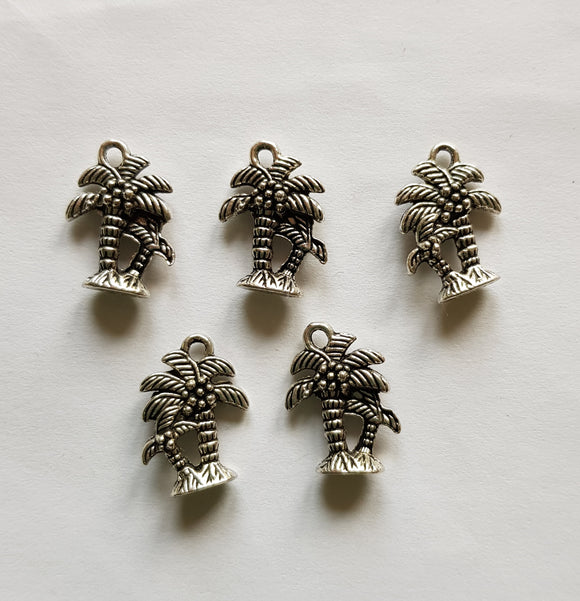 Silver plated palm tree charms.