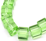 Glass cube beads, green, 5mm x 5mm.