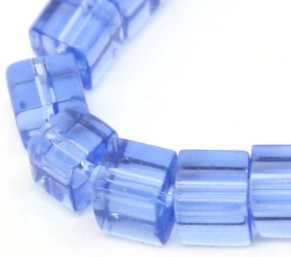 Glass cube beads, blue, 5mm x 5mm.