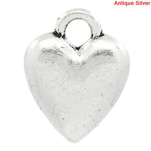 Antique silver heart charms.