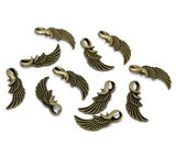 Antique bronze wing charms/pendants. 31mm x 14mm.